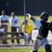 Saline catcher Trent Theisen throws to first in the game against Bedford on Monday, June 3. Daniel Brenner I AnnArbor.com